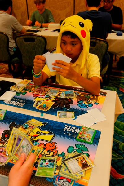 The finalist of the 2012 PokÃ©mon world Championships play at the Hilton Waikoloa Village Sunday, Aug. 12, 2012, in Waikoloa, Hawaii. The world champion PokÃ©mon card player and video game player will be crowned.  Photo By PokÃ©mon World Championships